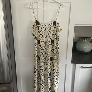 Elegant Women's Dress with Black and Gold Pattern